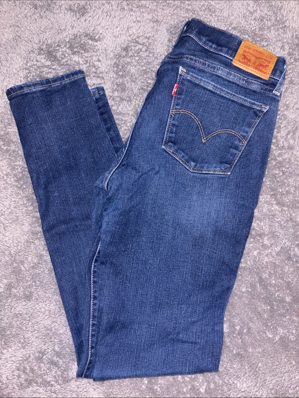 Levi’s Women's 710 Jeans Classic Back Pocket in Dark Indigo Super Skinny Leg
